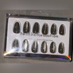 “Enchanted Forest” (olive green) almond, short press-on nails.